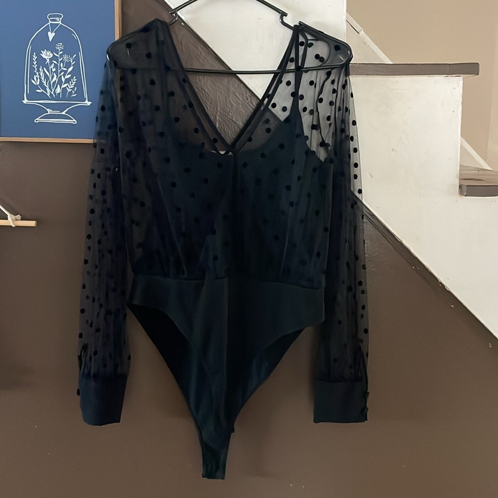 Black polka dot body suit with sheer blouse size L